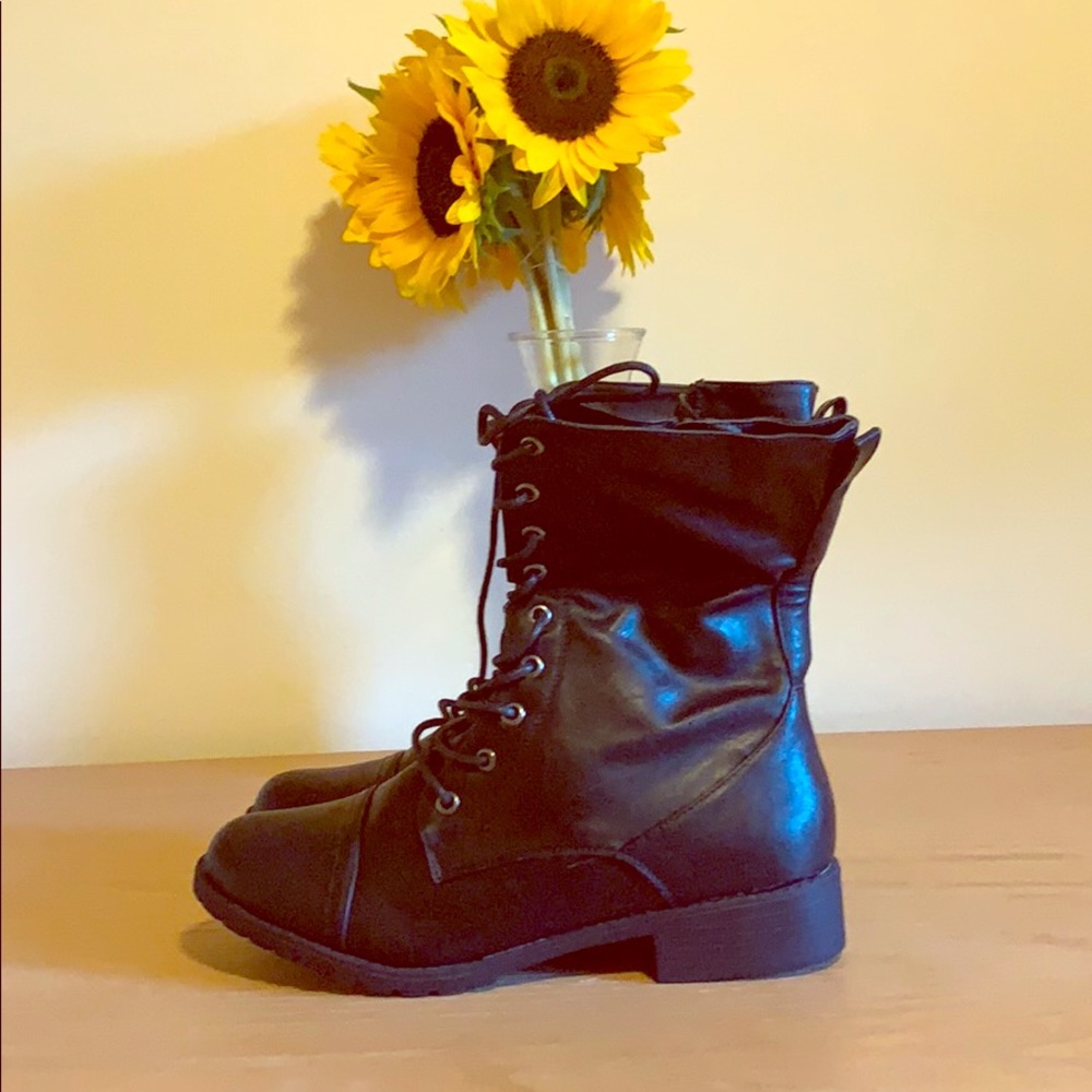 Black leather combat boots